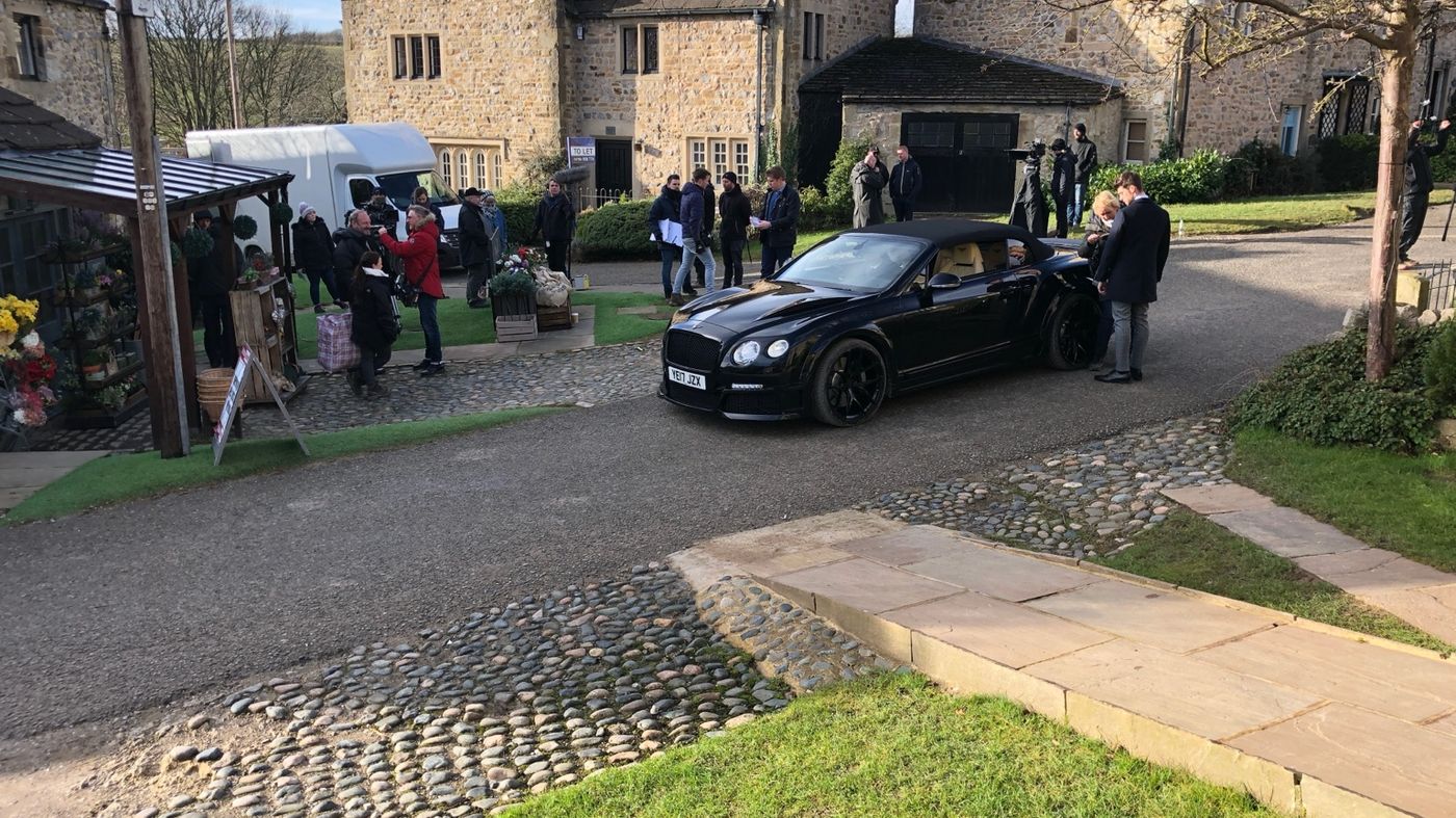Black Bentley Continental GTC photographed on location